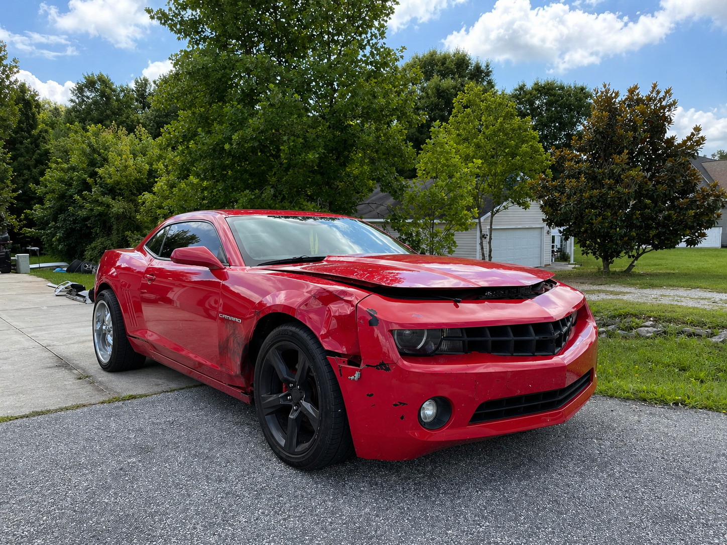 Red Camaro before body repair