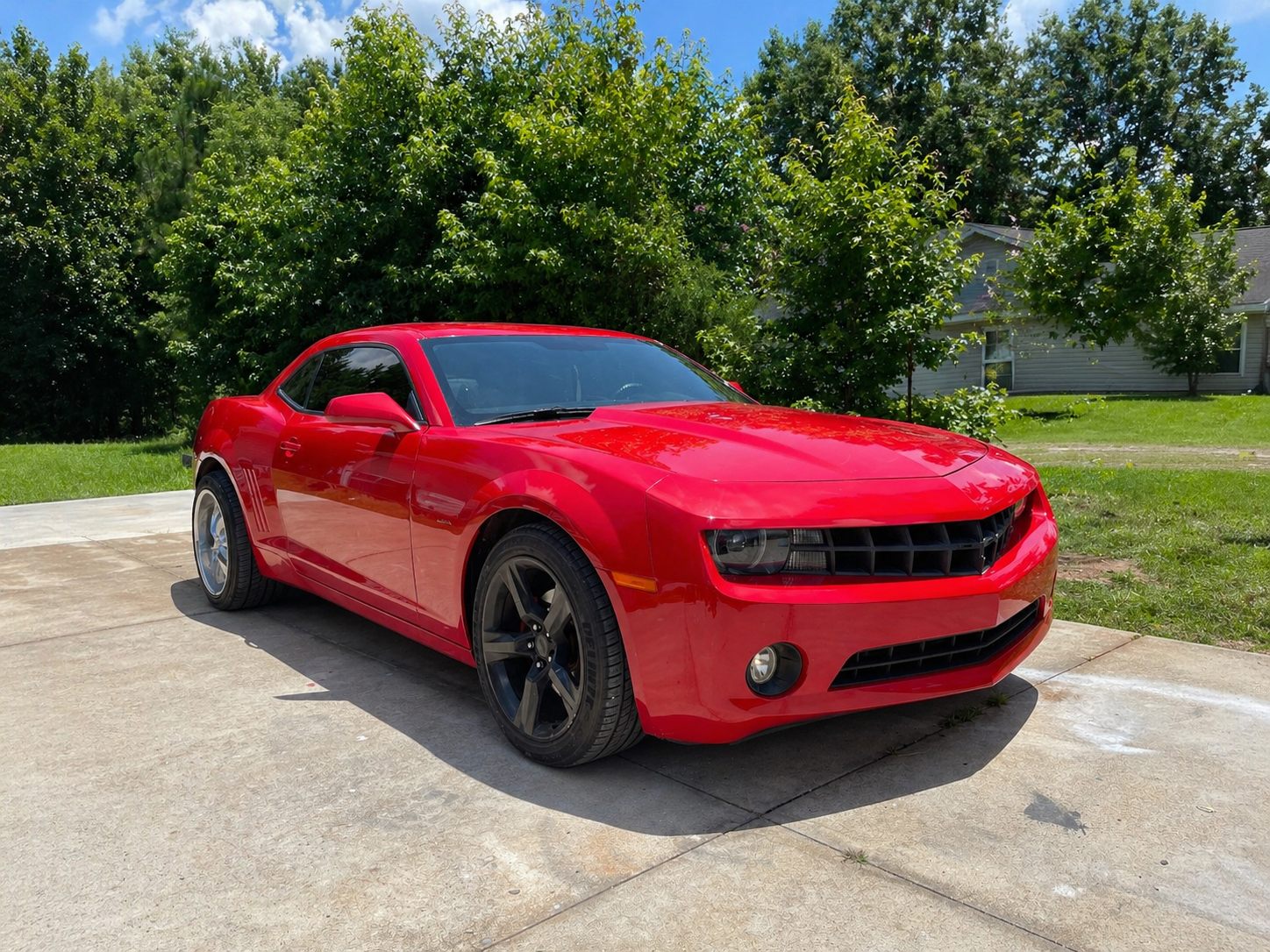 Red Camaro after body paint repair