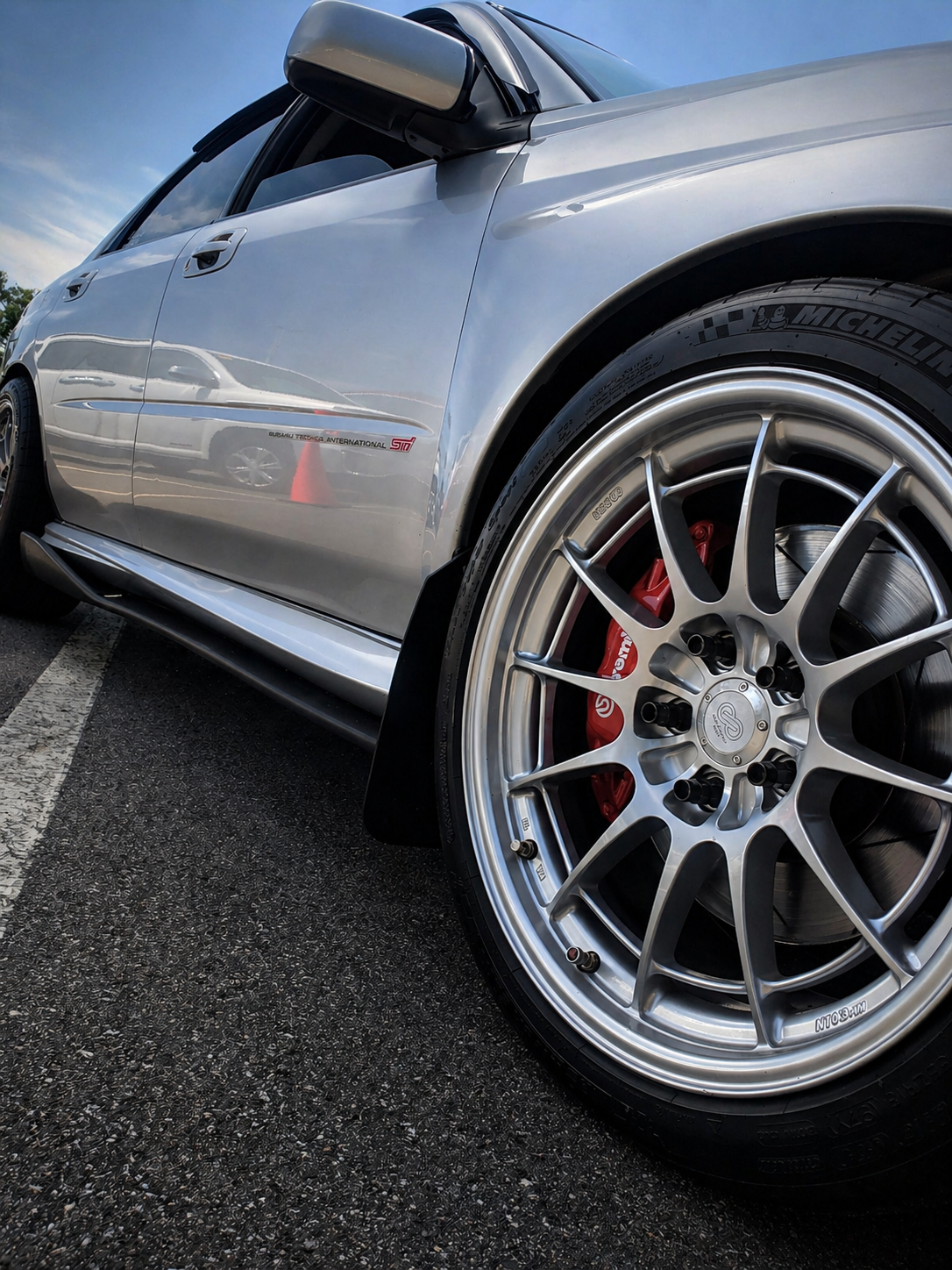 Subaru STI with silver performance wheels