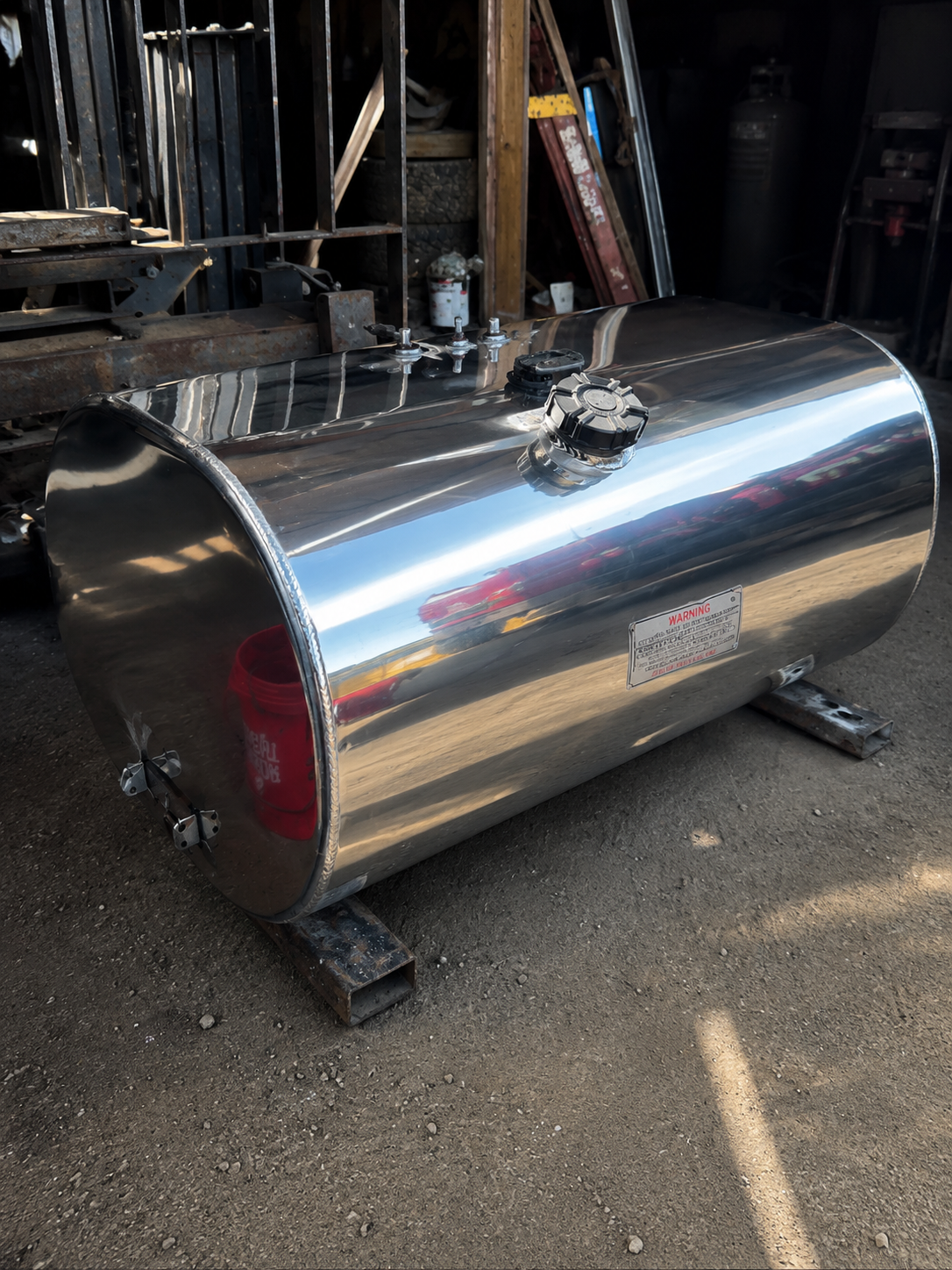 Polished aluminum truck tank with mirror finish